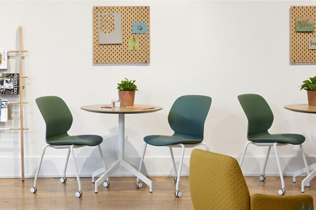 Maari Chair 4-Leg Base with Upholstered Seat in lifestyle shot